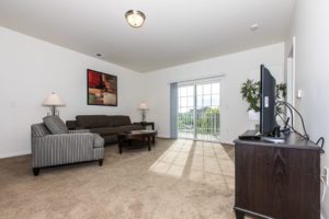 Balcony off of living room at Preston Gardens apartments